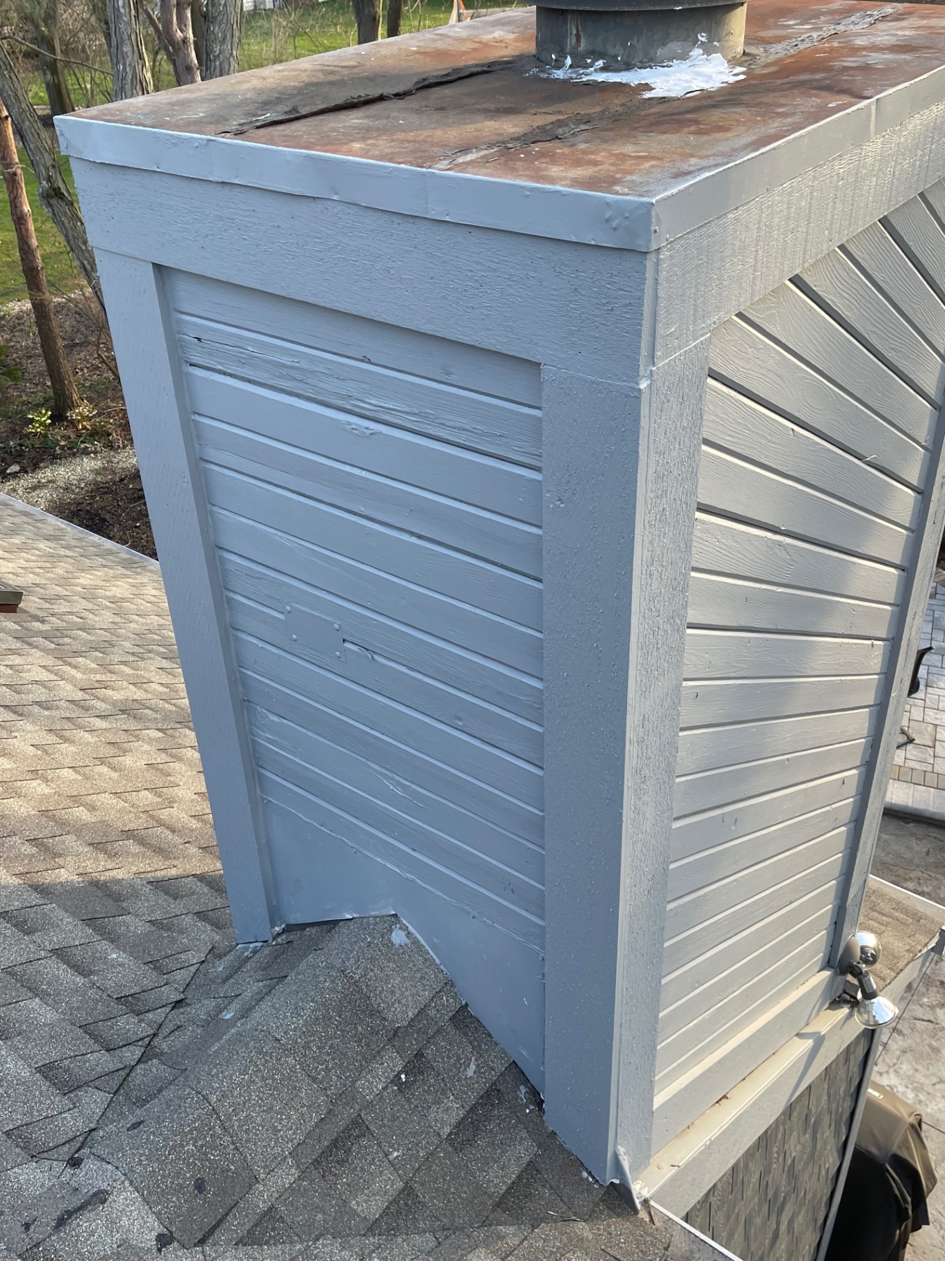 Chimney chase after repair and paint